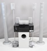 Pioneer VSX-921 home cinema audio/video multi-channel receiver together with a set of eight Canton