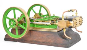 Victorian or early 20th century style twin cylinder live steam mill engine with twin spoked