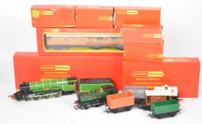 Two Hornby 00 gauge model railway locomotives comprising GWR 0-6-0 tank R051 and LNER 4-6-2 Flying