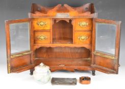 Victorian railway interest mahogany smoker's cabinet with bevelled glass panels to each door,