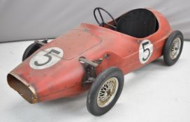 Tri-ang or similar children's pressed steel pedal car in the style of a Vanwall Grand Prix racer,