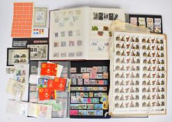 A quantity of mostly mint King George V to Queen Elizabeth II stamps in three stockbooks, together