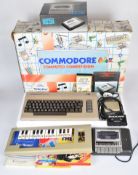 Commodore 64 retro gaming system 'Computer Compendium' edition, with power supply, cassette deck,