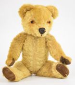 Vintage Teddy bear with golden mohair, disc jointed limbs, felt pads, stitched features and growler,