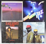 Approximately sixty Hard Rock / Heavy Metal / Prog Rock / Rock LPs including Guns n Roses, Def