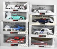 Eight UT Models 1:18 scale diecast model sports cars to include Mercedes SLK 230, Chevrolet
