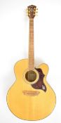 Washburn Cumberland J28SCEDL jumbo electro acoustic guitar with spruce top, quilted maple back,