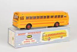 Dinky Supertoys diecast model Wayne School Bus with yellow body, red trim, red hubs and interior,