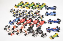 Twenty five Minichamps, Onyx and similar diecast model Formula 1 cars.