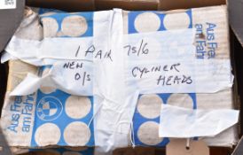 A pair of BMW R75/6 new old stock cylinder heads in original BMW boxes