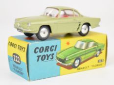 Corgi Toys diecast model Renault Floride with metallic green body, red interior, silver hubs and