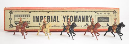 Britains Imperial Yeomanry, set number 105, comprising five mounted painted metal soldiers on black,