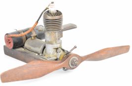 Gwin Aero vintage model aeroplane petrol engine, on wooden bearers with fuel tank, propellor and
