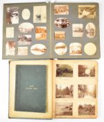 Two Edwardian photograph albums containing approximately three hundred images of social history from