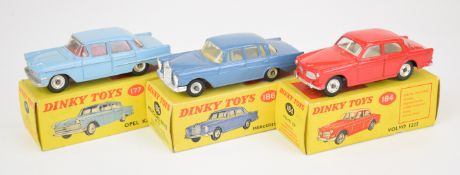 Three Dinky Toys diecast model cars comprising Opel Kapitan 177, Volvo 122S 184 and Mercedes-Benz