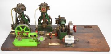 Display of four Stuart live steam engines comprising two each of 10H and 10V designs, one of the