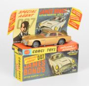 Corgi Toys diecast model James Bond 007 Aston Martin DB5 with gold body, red interior, opening