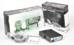 Two vintage CB radios comprising Radiomobile CB201 and DNT B40 FM, both in original boxes.