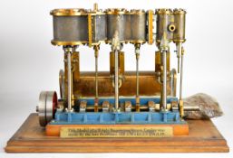 Sir Charles Inglis triple expansion live steam marine engine with condenser housing to rear, with
