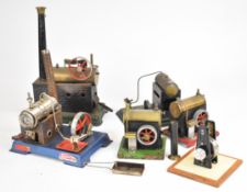 Six live steam stationary engines comprising Doll et Cie with faux brick firebox surround and DC
