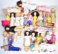 Thirty one mostly vintage Sindy fashion dolls by Pedigree and Hasbro, all in original outfits.