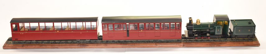 34mm gauge model of a steam rack railway locomotive and two carriages, built by the award winning