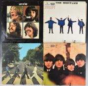 A collection of fifteen Beatles related LPs comprising two Abbey Road, Beatles For Sale, Help!,