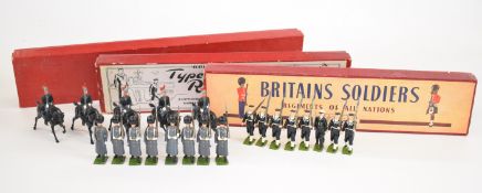 Twenty one Britains painted metal soldiers comprising Grenadier Guards set number 312, Royal Horse