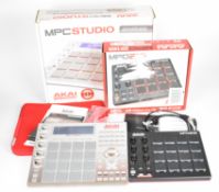 Two Akai Profesional MIDI controllers comprising MPC Studio and MPD 218, both in original boxes with