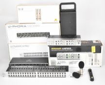 Behringer home studio recording equipment comprising C-2 Studio Condenser Microphones, Ultrapatch