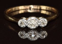 A 9ct gold ring set with three diamonds in a platinum setting, in antique box, 1.4g, size P