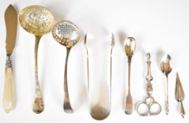 Georgian and later hallmarked silver items to include two sifter ladles, sugar nips, fiddle