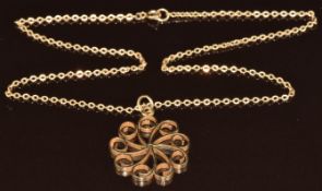 A 9ct gold pendant with scrolling decoration, on 9ct gold chain, 6.6g, 41cm
