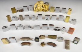 Prince table lighter in the form of monkey / chimpanzee resting against tree stump and a