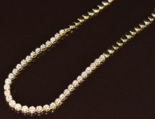 A 9k gold necklace set with thirty-four round cut diamonds, each approximately 0.01ct, 10.3g,  45cm
