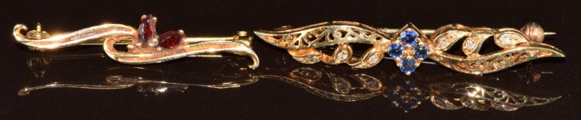 Two 9ct gold brooches one set with garnets and the other sapphires and diamonds, 4.2g