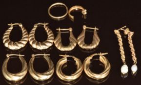 Five pairs of 9ct gold earrings comprising four hoops and one rope twist set with a pearl, and two