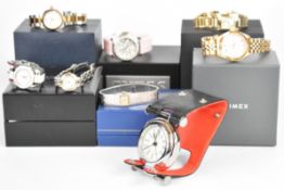 Eight various wristwatches including Guess, Rotary, Tissot and Timex, most in original boxes