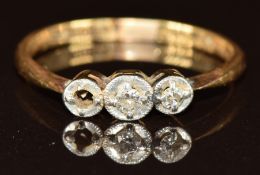 An 18ct gold ring set with two diamonds (one diamond missing) in a platinum setting, 2.3g, size Q