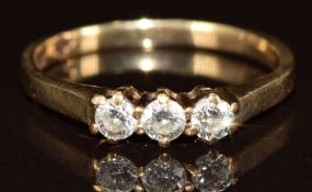 A 9ct gold ring set with three diamonds, 1.5g, size J/K