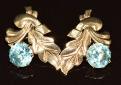 A pair of 9ct gold earrings in a stylised foliate design each set with a round cut zircon, 5g, 2.2 x