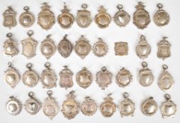 Thirty six hallmarked silver sporting or similar medals/ fobs one with engraving 'NCB Area 1