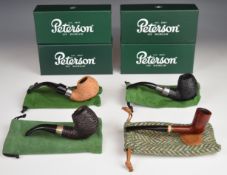 Four Peterson smoking pipes comprising 30 System Spigot Sandblasted, St Patrick's Day 2023, Deluxe