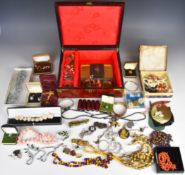A collection of jewellery including garnet necklace, mother of pearl, coral and shell necklaces,