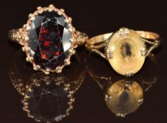 Two 9ct gold rings one set with paste and the other a garnet, 9.4g, size T & O
