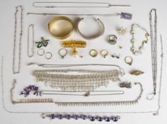 A collection of jewellery including 9ct gold earrings set with a sapphire, yellow metal ring, tru
