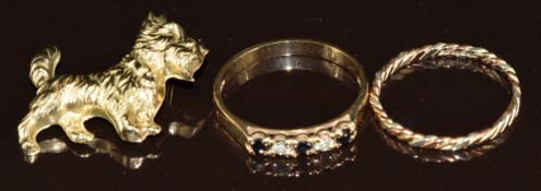 Two 9ct gold rings, one set with sapphires and cubic zirconia, together with a 9ct gold brooch, 3.