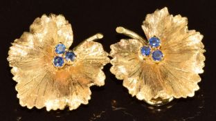 A pair of 18k gold Italian clip earrings in the form of leaves set with sapphires, 8.5g, 2 x 1.7cm