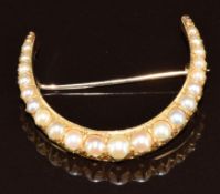 Victorian crescent shaped brooch set with split pearls, 5.8g, 3.5cm