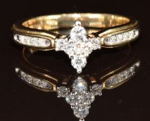 A 10k gold ring set with diamonds, the total diamond weight approximately 0.25ct, 3.4g, size N